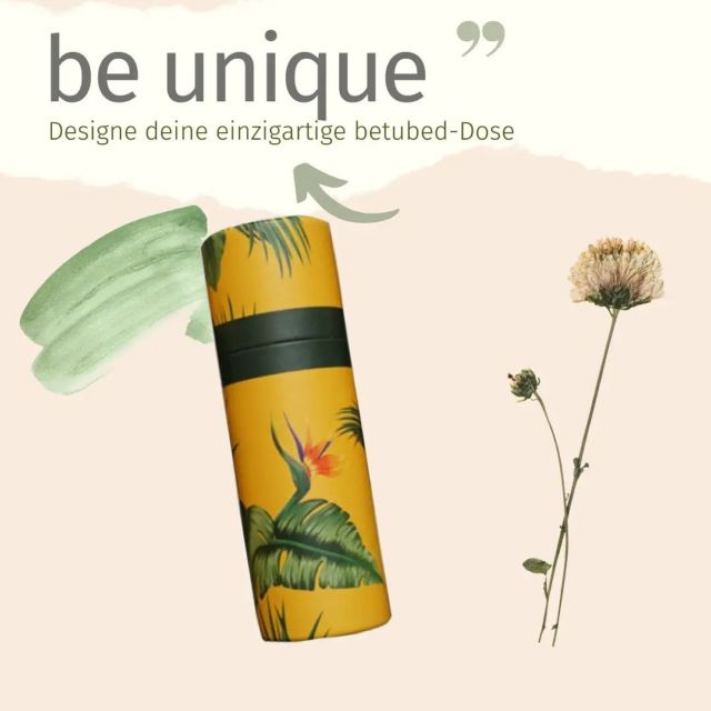 Individuell gestaltete Pappdose mit floralen Mustern und dem Text 'be unique', ideal für einzigartige Verpackungen